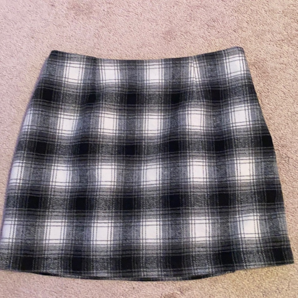 A nice plaid, black and white skirt.